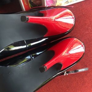 Pleaser 9 black and red patent heels, fit more of an 8 1/2